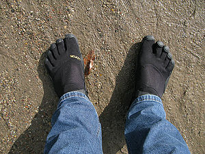 Man wearing a pair of black Vibram FiveFingers...